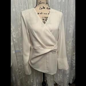 Elevate Your Wardrobe with the Timeless White Blouse from Express!